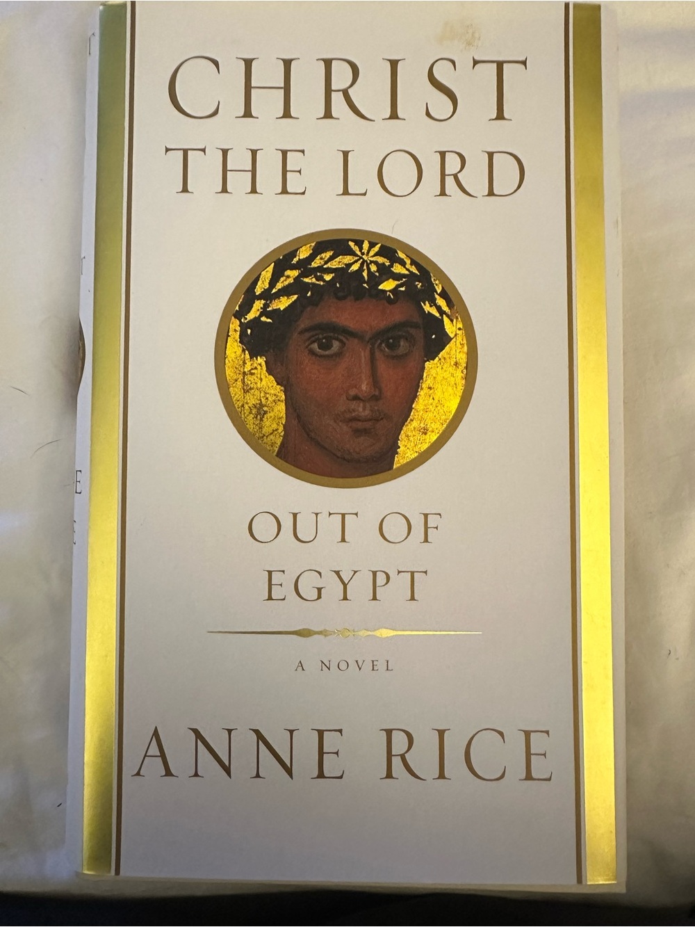 'Christ the Lord: Out of Egypt' Hardcover Book - White and Gold
